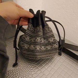 It's a small bag that has elephants on it